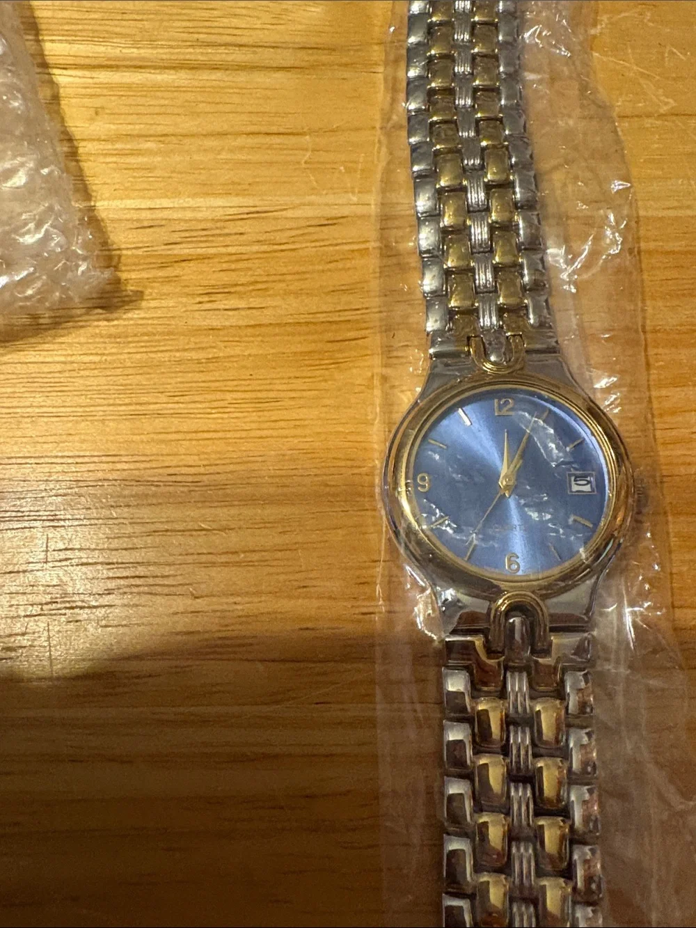 Avon Two-Tone Gold and Silver Bracelet Watch with Blue Dial